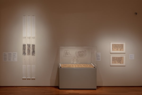 Tao Aimin, In a Twinkle No. 6, 2011, Ink rubbing on paper, set of three hanging scrolls with nushu (women’s script); Xu Bing, Introduction to Square Word Calligraphy (New English Calligraphy), 1994-1996, Calligraphy, ink on paper; Xu Bing, SWC-Sketch for Song of Wandering Aengus Poem by William Butler Yeats, 1999, Calligraphy, ink on paper.